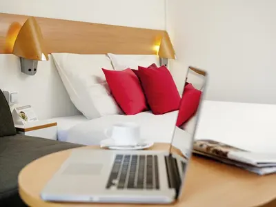 Łóżko lub łóżka w pokoju w obiekcie Novotel Warszawa Airport