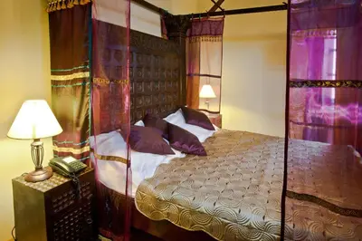 Łóżko lub łóżka w pokoju w obiekcie Castle Inn