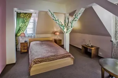 Łóżko lub łóżka w pokoju w obiekcie Castle Inn