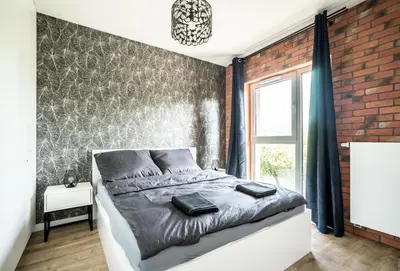 Łóżko lub łóżka w pokoju w obiekcie Grand Lux apartment Grodzienska Near to theOldTown