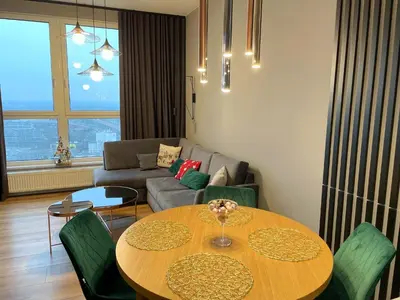 Część wypoczynkowa w obiekcie Praga 23rd Floor High-Class Apartment by BookingHost