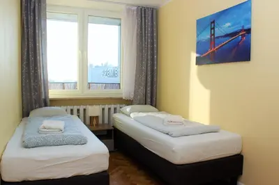 Łóżko lub łóżka w pokoju w obiekcie Labo Apartment Platynowa