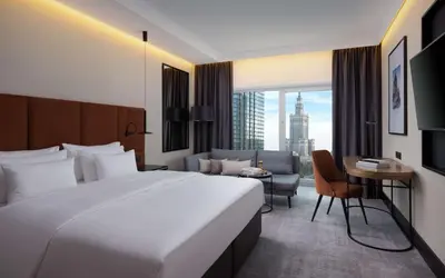 Łóżko lub łóżka w pokoju w obiekcie Radisson Collection Hotel, Warsaw