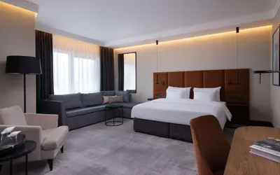 Łóżko lub łóżka w pokoju w obiekcie Radisson Collection Hotel, Warsaw