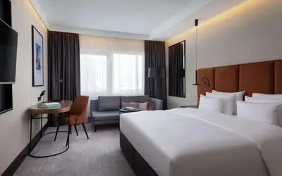 Łóżko lub łóżka w pokoju w obiekcie Radisson Collection Hotel, Warsaw