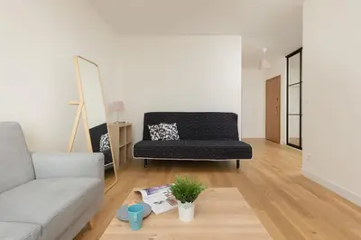 Część wypoczynkowa w obiekcie Warsaw Apartment Sierakowskiego by Noclegi Renters