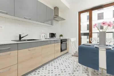 Kuchnia lub aneks kuchenny w obiekcie Warsaw Apartment Sierakowskiego by Noclegi Renters
