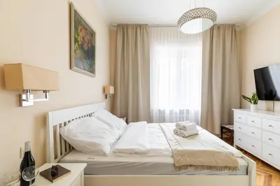 Łóżko lub łóżka w pokoju w obiekcie P&O Serviced Apartments Plac Konstytucji