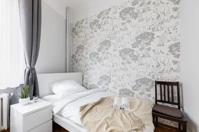 Łóżko lub łóżka w pokoju w obiekcie P&O Serviced Apartments Plac Konstytucji