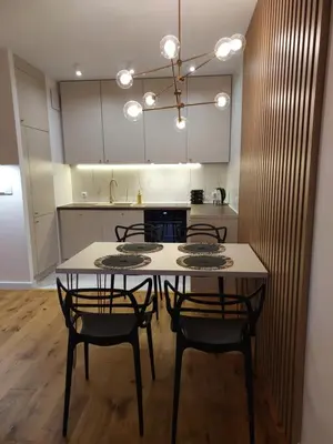 Kuchnia lub aneks kuchenny w obiekcie M2 Bemowo apartament