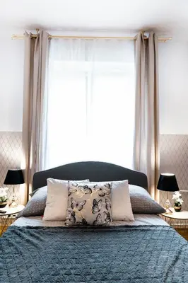Łóżko lub łóżka w pokoju w obiekcie ClickTheFlat Royal Route Warecka Apart Rooms