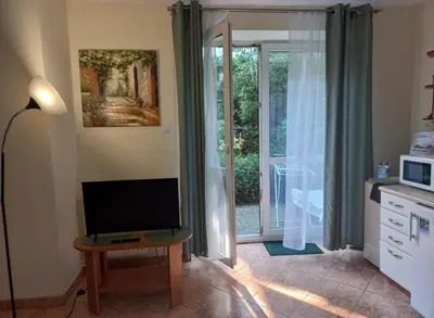Telewizja i/lub zestaw kina domowego w obiekcie Apartament Sadul