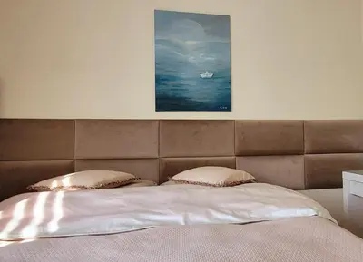 Łóżko lub łóżka w pokoju w obiekcie Comfort Warszawa