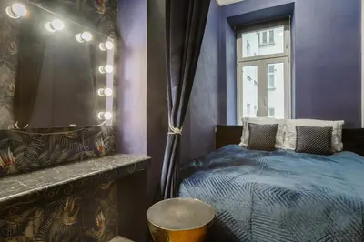 Łóżko lub łóżka w pokoju w obiekcie Hello Warsaw I Stunning Apartment above the Theater