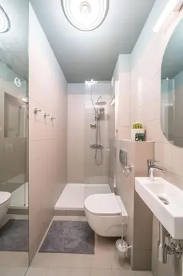 Łazienka w obiekcie Apartament Fala 15min Metro to PGE Narodowy Self-Checkin Klub Stodoła SGH Parking Parkview Fast Wifi