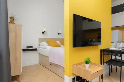 Łóżko lub łóżka w pokoju w obiekcie Apartment Warsaw Mokotów Św Boboli by Noclegi Renters