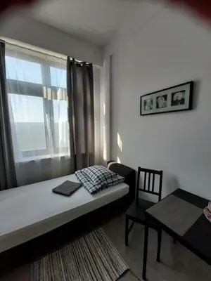 Łóżko lub łóżka w pokoju w obiekcie Pinto Guest Rooms