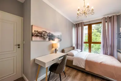 Łóżko lub łóżka w pokoju w obiekcie Prestige Verdant Apartment by BookingHost