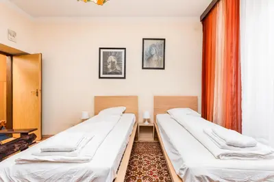 Łóżko lub łóżka w pokoju w obiekcie Apartament Żelazna 101 by Homeprime
