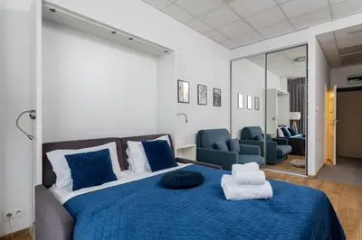 Łóżko lub łóżka w pokoju w obiekcie ALE Jerozolimskie Varsovia Apartments