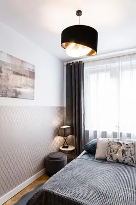 Łóżko lub łóżka w pokoju w obiekcie ClickTheFlat Krucza City Center Apart Rooms