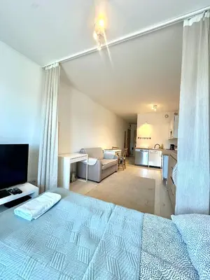 Łóżko lub łóżka w pokoju w obiekcie Warsaw Inside Pola Karolińskie
