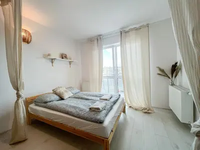 Łóżko lub łóżka w pokoju w obiekcie Warsaw Inside Pola Karolińskie