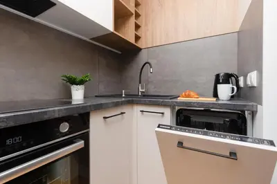 Kuchnia lub aneks kuchenny w obiekcie Warneńska Apartment by Noclegi Renters