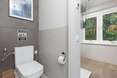 Łazienka w obiekcie Warneńska Apartment by Noclegi Renters