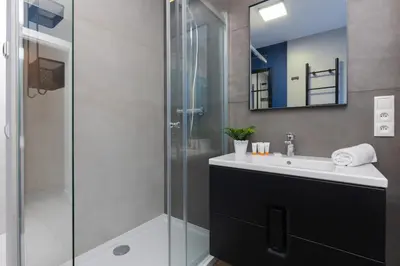 Łazienka w obiekcie Warneńska Apartment by Noclegi Renters