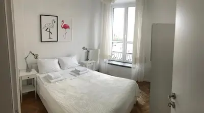 Łóżko lub łóżka w pokoju w obiekcie Apartament Warecka
