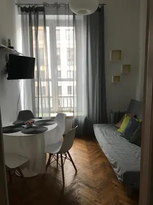 Łóżko lub łóżka w pokoju w obiekcie Apartament Warecka