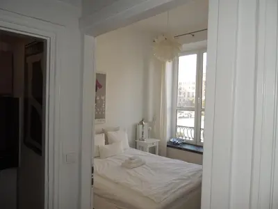 Łóżko lub łóżka w pokoju w obiekcie Apartament Warecka