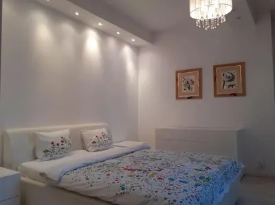 Łóżko lub łóżka w pokoju w obiekcie Apartamenty - MI Premium