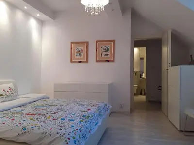 Łóżko lub łóżka w pokoju w obiekcie Apartamenty - MI Premium