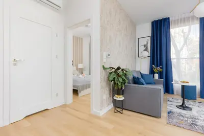 Łóżko lub łóżka w pokoju w obiekcie Warszawa Śródmieście Bonifraterska Apartments by Noclegi Renters