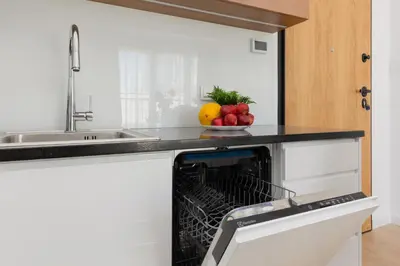 Kuchnia lub aneks kuchenny w obiekcie Warszawa Śródmieście Bonifraterska Apartments by Noclegi Renters