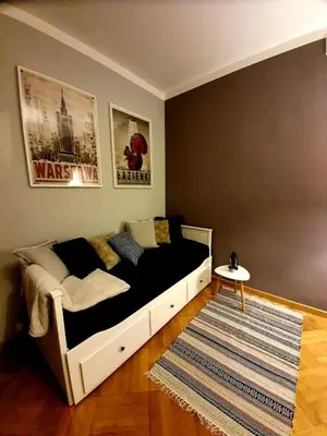 Łóżko lub łóżka w pokoju w obiekcie Vistula studio