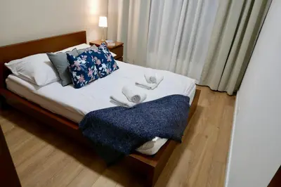 Łóżko lub łóżka w pokoju w obiekcie Zdrowa Apartment in Wilanów