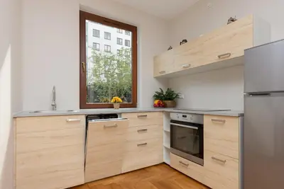 Kuchnia lub aneks kuchenny w obiekcie Warsaw Bobrowiecka Apartment by Noclegi Renters