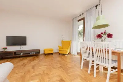 Telewizja i/lub zestaw kina domowego w obiekcie Warsaw Bobrowiecka Apartment by Noclegi Renters