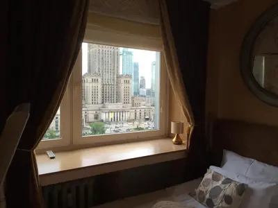 Łóżko lub łóżka w pokoju w obiekcie Amica Apartment by WarsawResidence Group