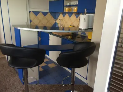 Kuchnia lub aneks kuchenny w obiekcie Amica Apartment by WarsawResidence Group