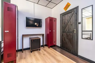 Telewizja i/lub zestaw kina domowego w obiekcie Vola Hostel