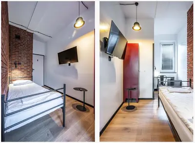 Łóżko lub łóżka w pokoju w obiekcie Vola Hostel