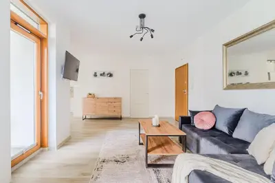 Telewizja i/lub zestaw kina domowego w obiekcie Slominskiego 7 P&O Apartments