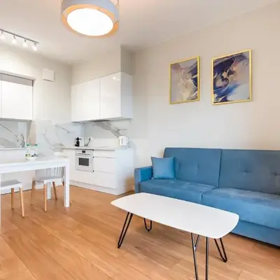 Wola Lush Apartment by BookingHost