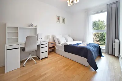 Łóżko lub łóżka w pokoju w obiekcie P&O Apartments Bitwy Warszawskiej II - Ochota