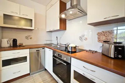 Kuchnia lub aneks kuchenny w obiekcie P&O Apartments Bitwy Warszawskiej II - Ochota