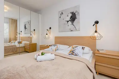 Łóżko lub łóżka w pokoju w obiekcie Warsaw Sokołowska One Bedroom Apartament by Noclegi Renters